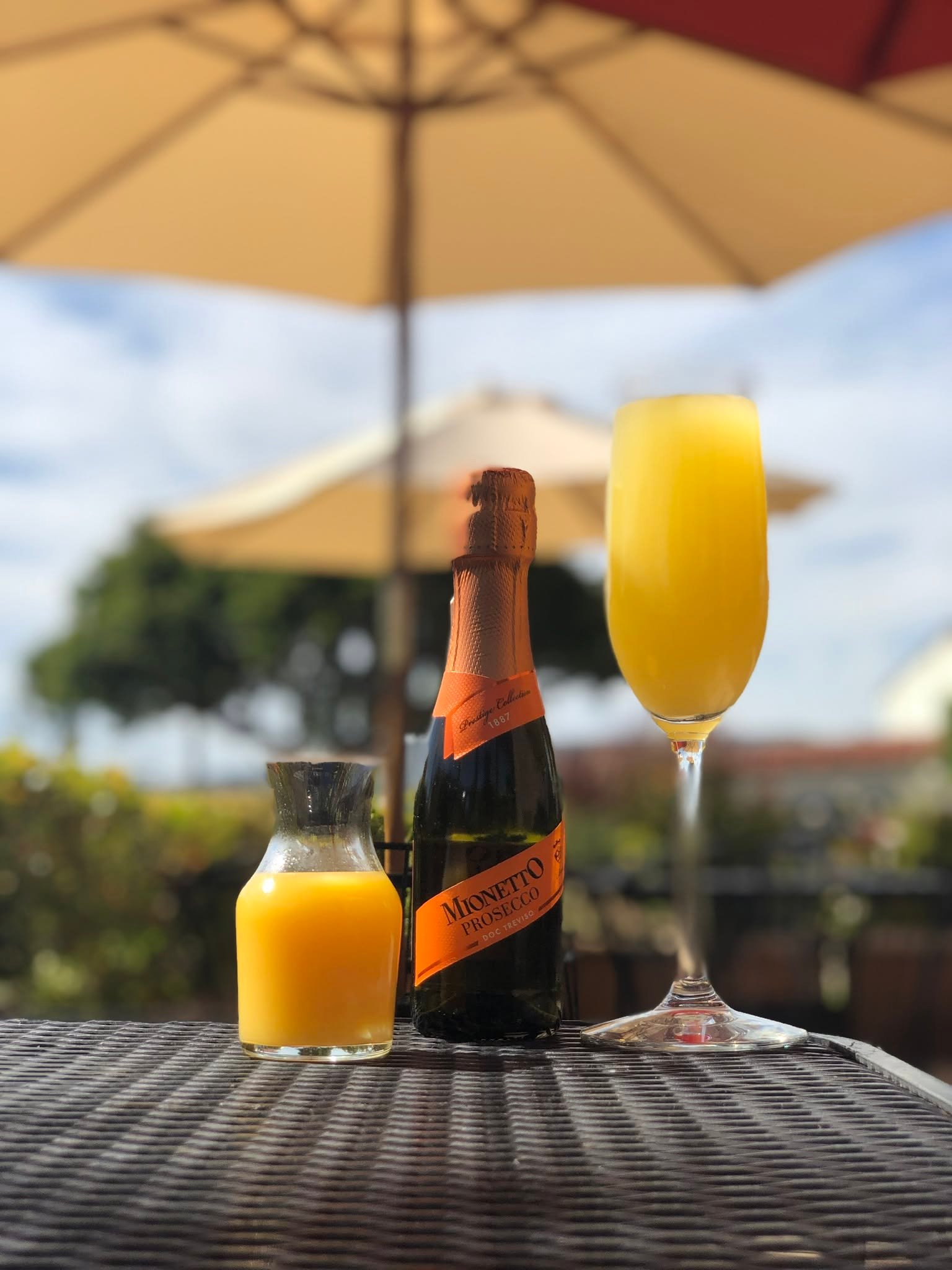 Bottomless mimosa on the sunny patio at Melville Tavern