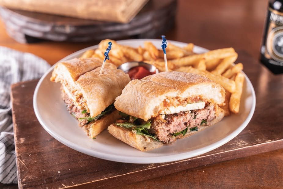 Gourmet burger on toasted ciabatta with fries