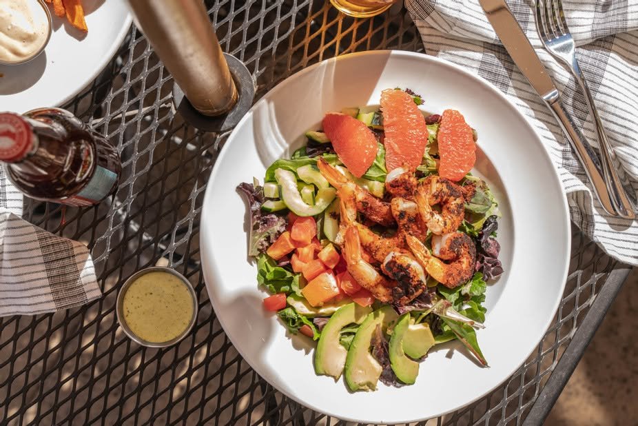 Blackened shrimp and citrus salad on the patio