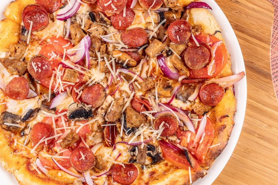 Wood-fired pepperoni and sausage pizza